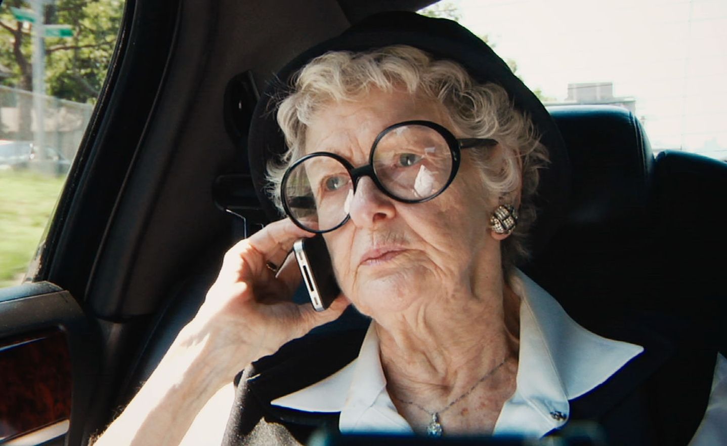 Elaine Stritch on the phone with her big glasses